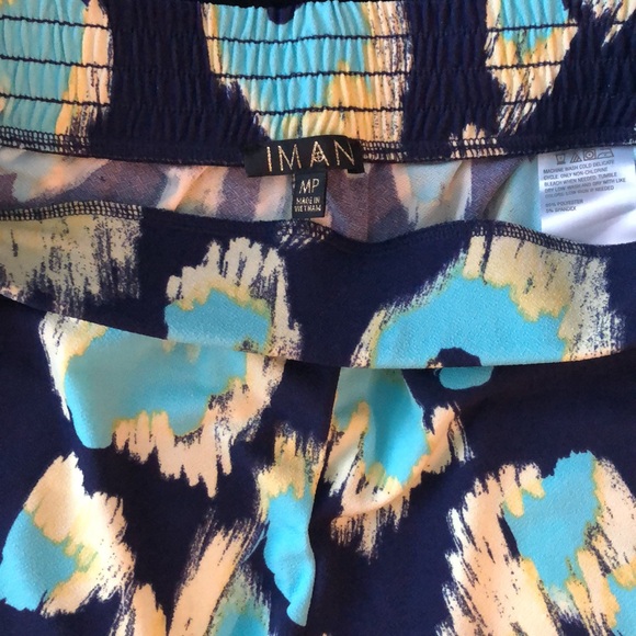 2 piece IMAN suit. Open jacket and pull on pants. Bright Navy, yellow, cheetah - Picture 10 of 16